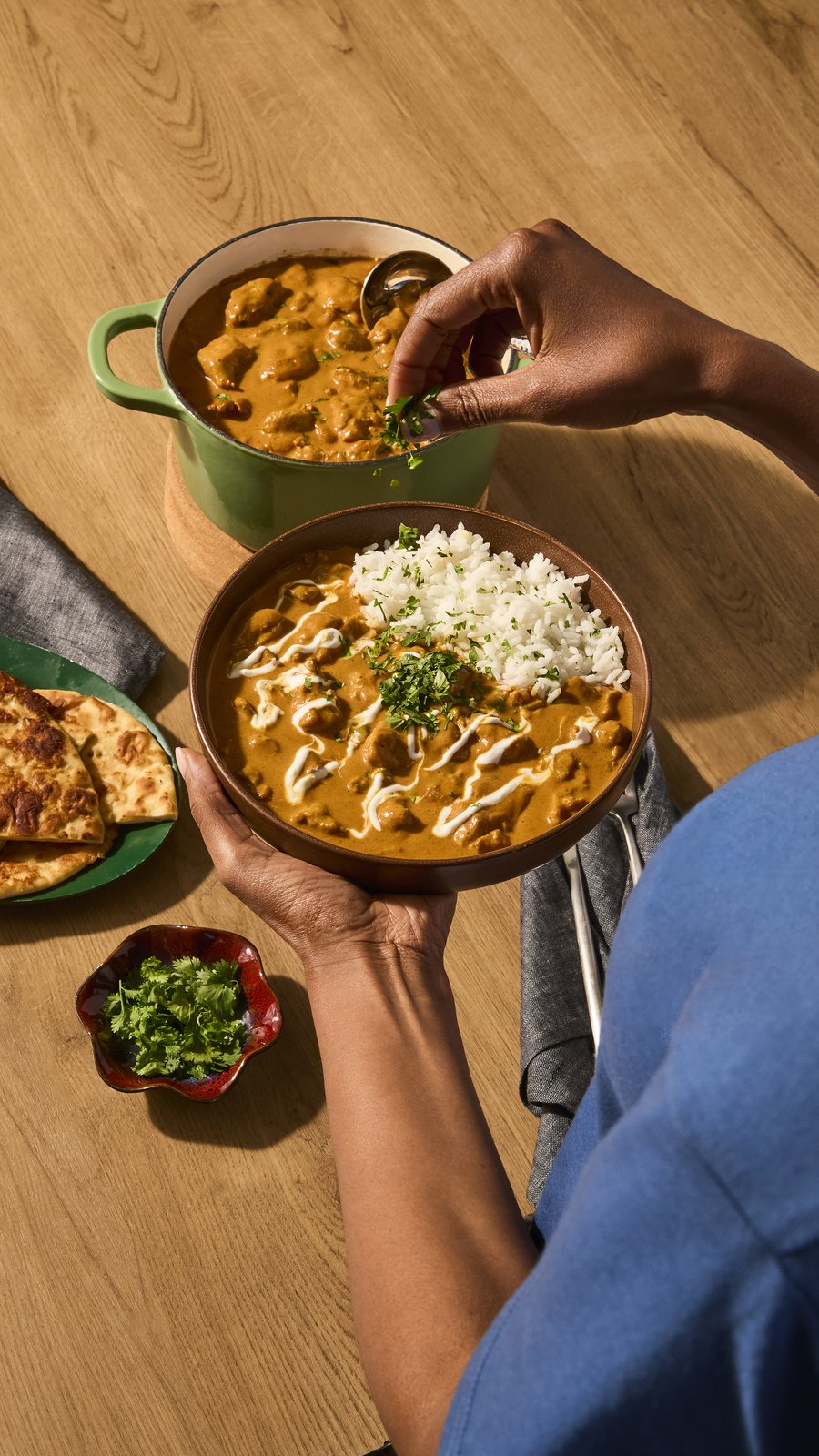 A curry served with rice, straight from the pot